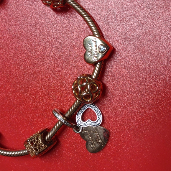 Authentic Pandora Beautiful 14k Rose gold bracelet with customized charms. - Picture 5 of 7
